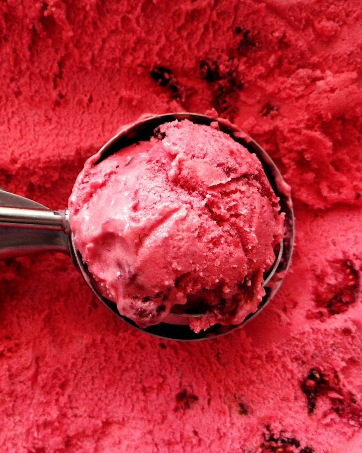 scoop of homemade raspberry ice cream