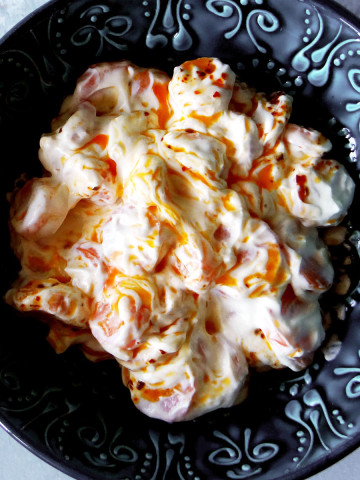 carrots with yogurt in a bowl