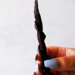 licorice wand in hand