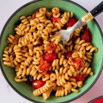plate of burst cherry tomato pasta