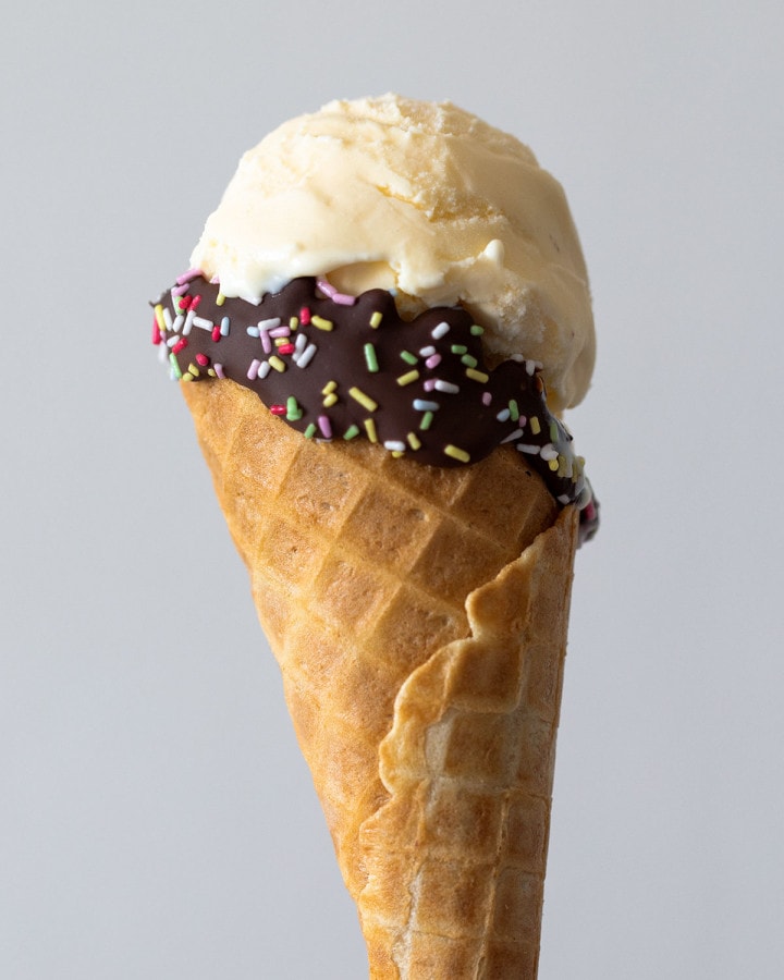 scoop of homemade French vanilla ice cream in a cone