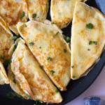 ham and cheese crepes on pan
